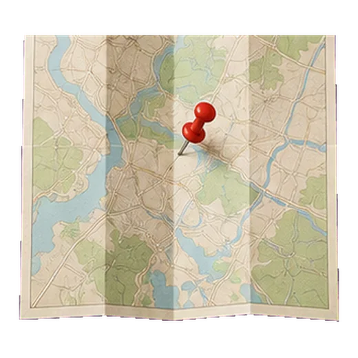 A folded map with a pin in it